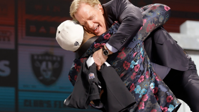 Tyree Wilson picks up Roger Goodell after being drafted #7 to the Las Vegas Raiders.